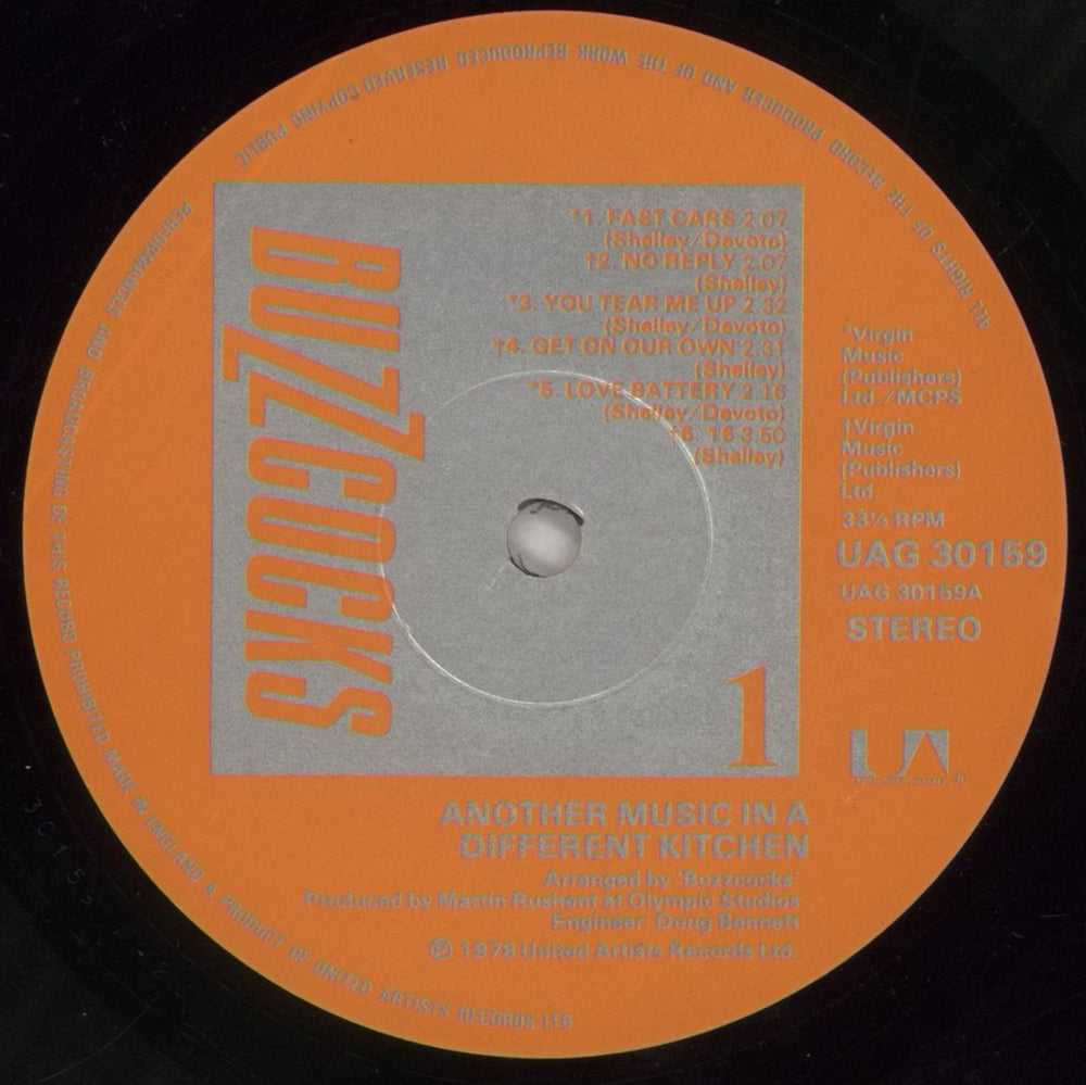 Buzzcocks Another Music In a Different Kitchen + Bag UK vinyl LP album (LP record) BUZLPAN500370