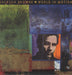 Jackson Browne World In Motion - EX UK vinyl LP album (LP record) EKT50